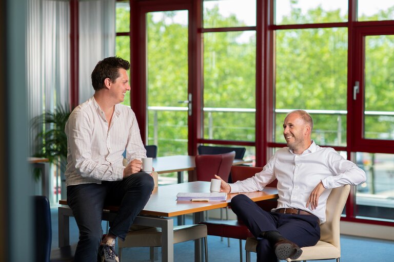 Medewerkers Bunnig in gesprek